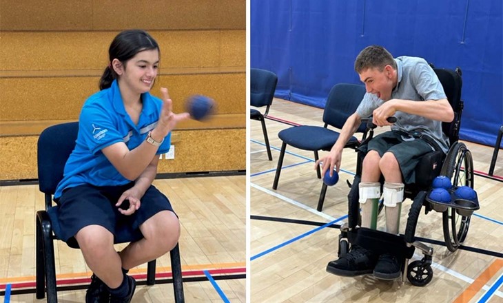 Girl in a chair and boy in a wheelchair catching a ball