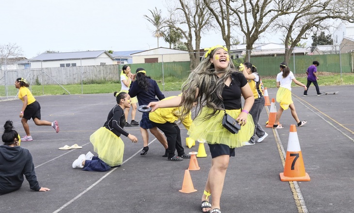 Young people laughing during a school activity