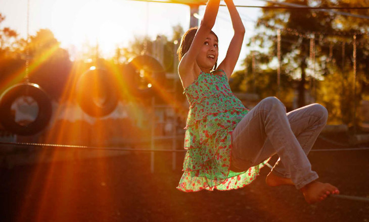 Wahine playing on a flying fox