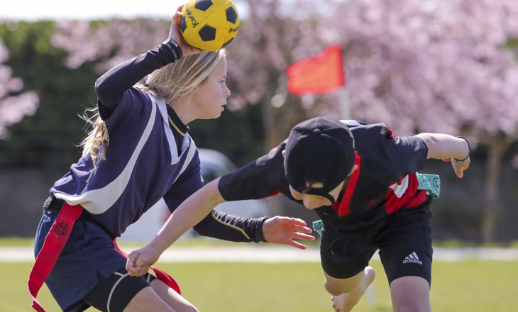 Playing Kī o rahi, a traditional Māori sport