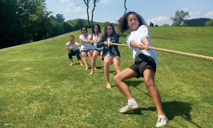 Wahine do battle on a tug-o-war rope