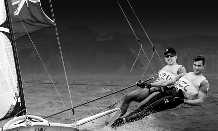 Sailors hiking out on a 2-person racing yacht