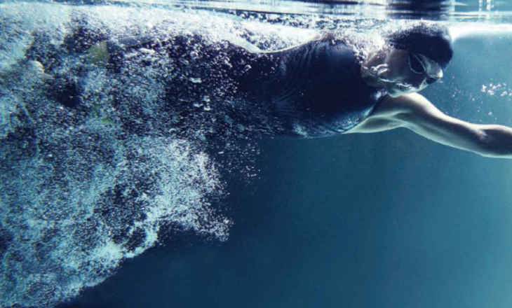 Stock image of swimmer underwater in a pool