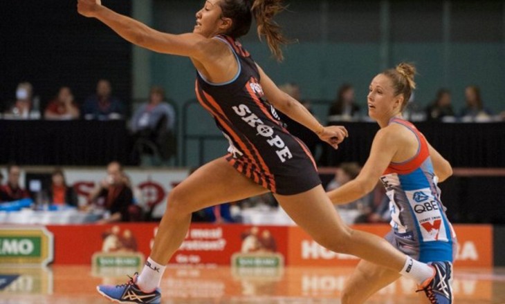 Erikana Pedersen jumping for possession of the netball
