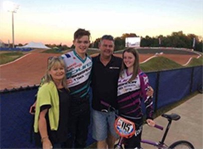 Jayden and Zoe Fleming with their parents next to the bmx track