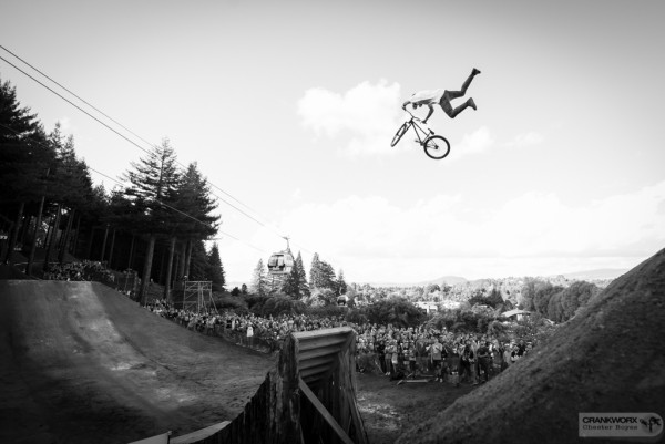 A youth completing a stunt on their bmx