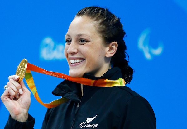 Sophie Pascoe holding her Rio medal up