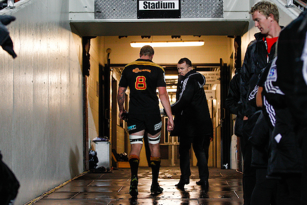 player walking off the pitch to the changing rooms