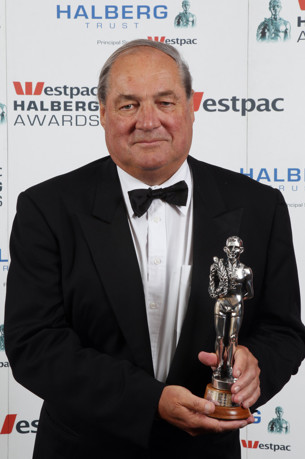 Sir John Anderson holding a Halberg award