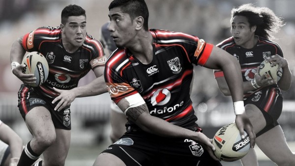 Three Warriors players in action on a banner