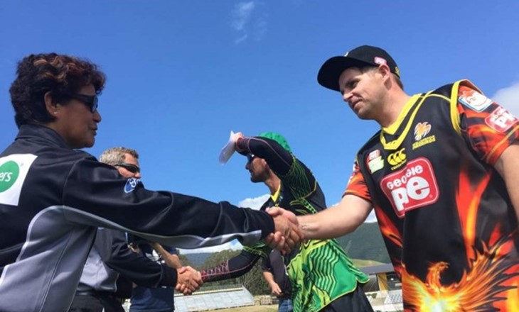 Wellington based umpire Kathy Cross shakes hands with player
