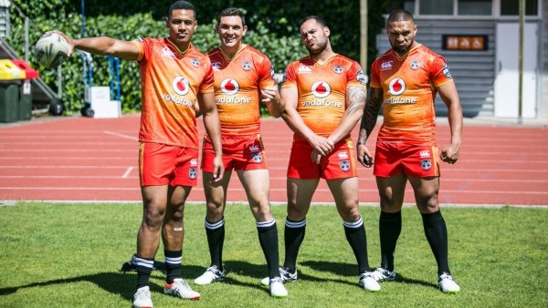 Four NRL players looking at camera