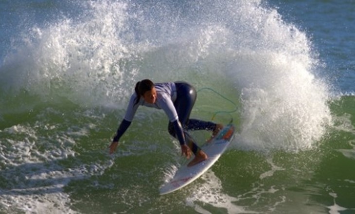 A member of the Maori Surfing Team competing 