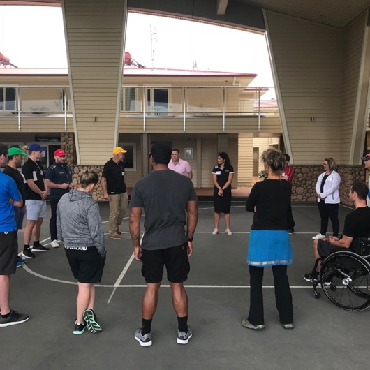 A group form a circle on a basketball court image