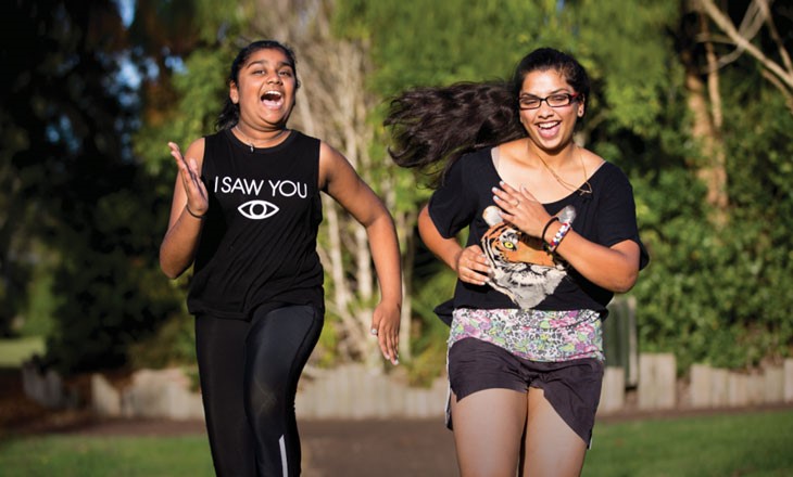 Two women having a social running race