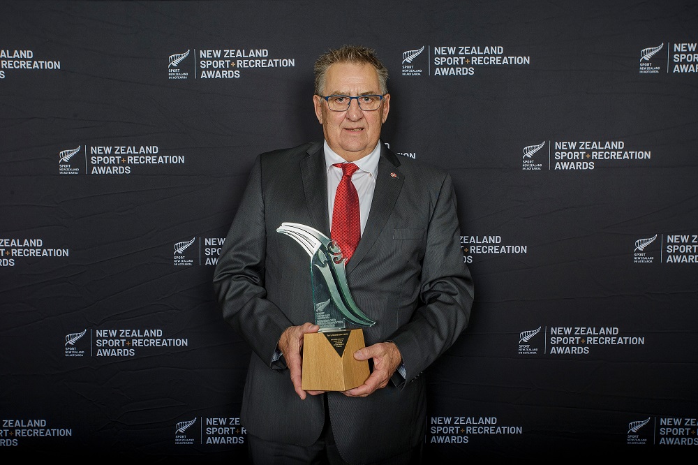 Terry Sheldrake standing with his award