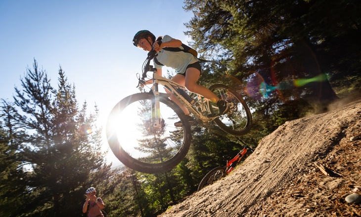 Young woman on mountain bike