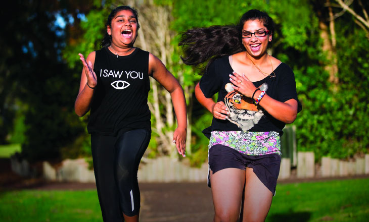 Two women having a social running race