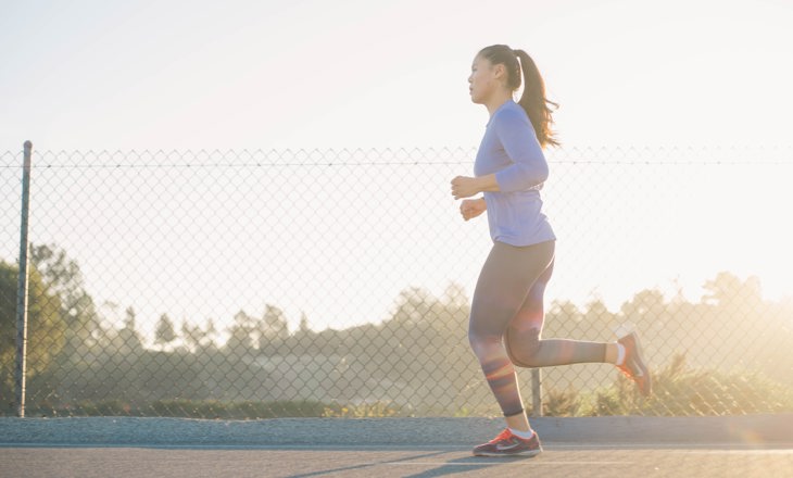 Girl running on road