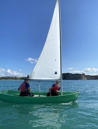 Two women in a sailboat