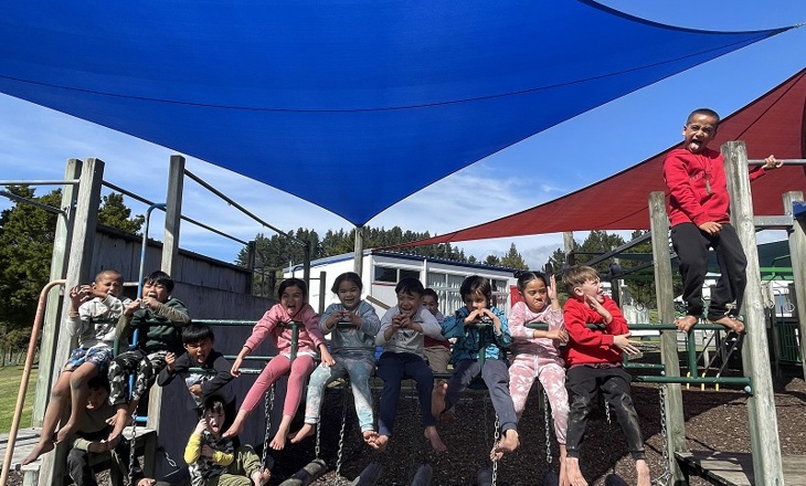 Tamariki Children playing on a playground