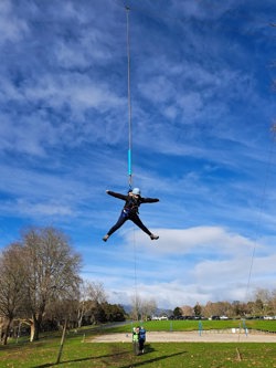 Young women on a high ropes course