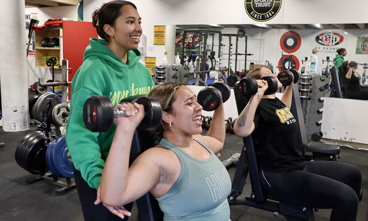 Three wahine during a Toitū Pōneke Community and Sports Centre workout session