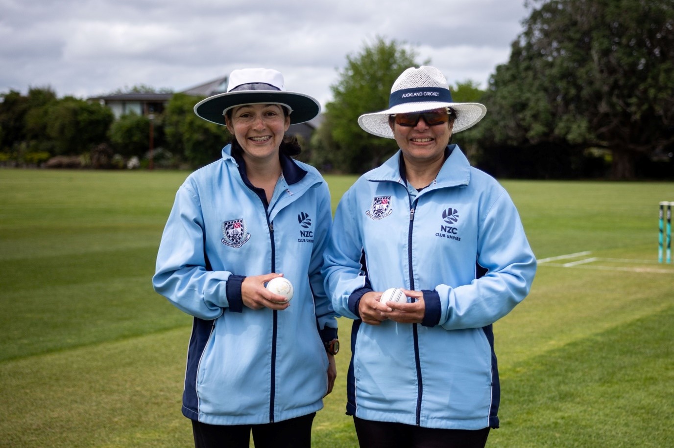 2023-24 Aspiring Female Umpire Programme Participants, Moth Sutherland-Tupp and Marise-Ann Fernandes, the on-field umpires for the Legends Cup match in Auckland