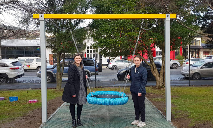 Ellen Devaney and Olivia Lee at the swing