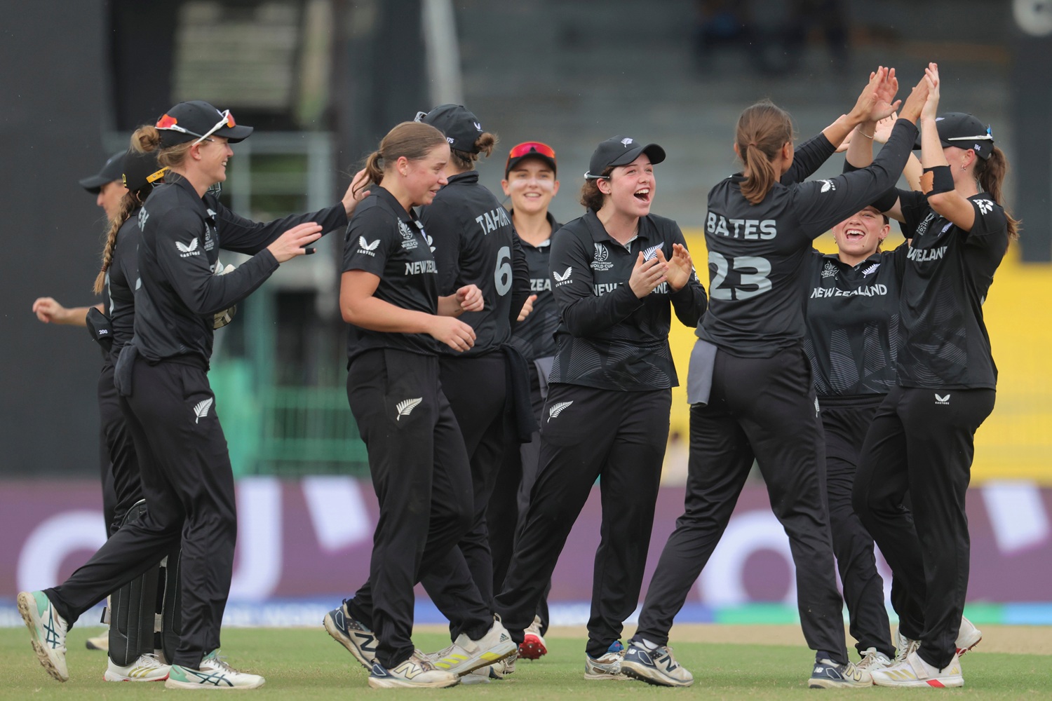Women's cricket team celebrating a win