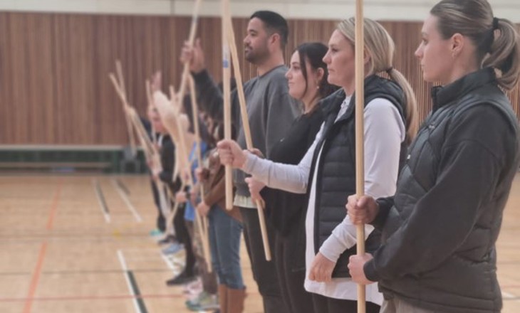 Group participating in traditional Maori games