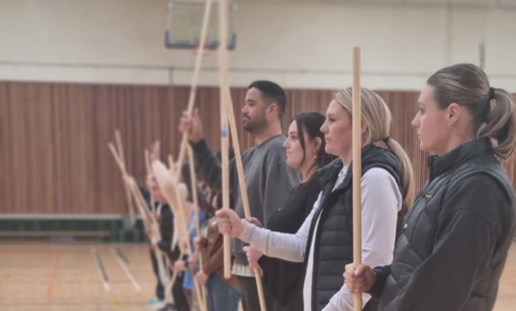 Group participating in traditional Maori games