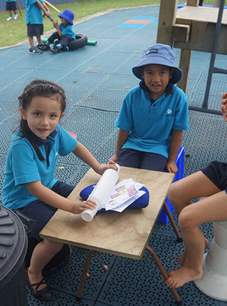 Tamariki/children at play in the playground